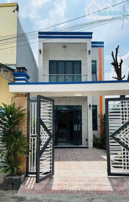 Bán nhà mt 1 trệt 1 lầu MT Tân Phú Trung Củ Chi,diện tích 126m2, shr
