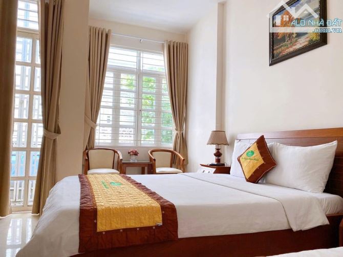 HÓT BÁN KHÁCH SẠN VÍP MẶT TIỀN HT45 NGANG 10M X 26M 8 TẦNG 55PN GIÁ GIẢM CÒN 33 TỶ