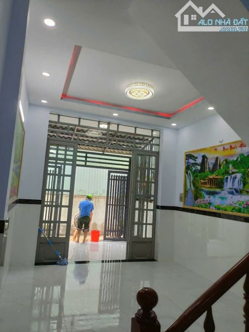 NHÀ 2 TẦNG BTCT MỚI SƠN ĐẸP - 59M2 THỔ CƯ, 4 PN - SÁT MẶT TIỀN TTH21 .