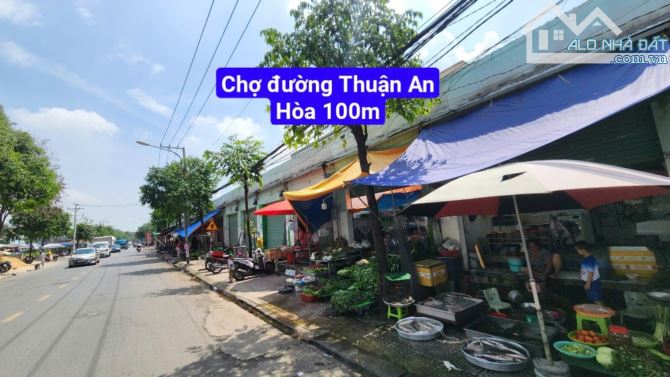 Bán lô góc 5.5x15m, đường D2 KDC Lê Phong Thuận Giao gần chợ 185 - 3