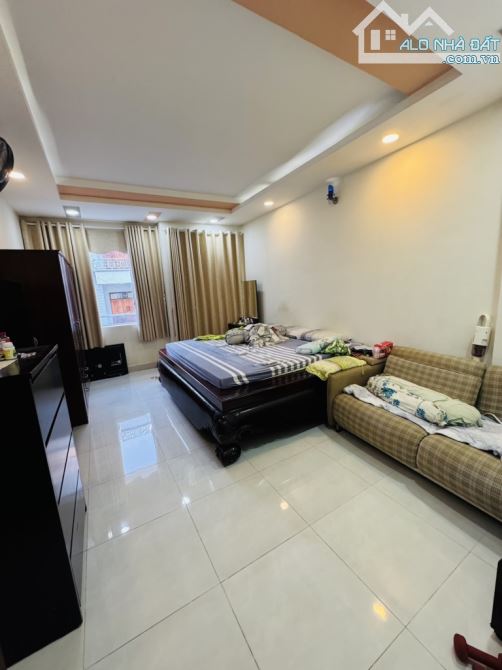 NHÀ MẶT TIỀN..ĐƯỜNG SỐ 4..P11 Q6..4 TẦNG ĐẸP..2 MẶT TIỀN..14.5 TỶ - 9