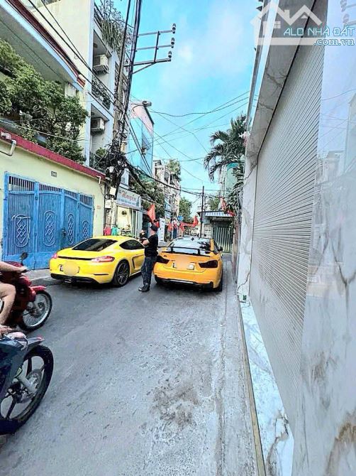 Nhà mới đẹp, mặt tiền kinh doanh 3 tầng, full nội thất cao cấp, Lạc Long Quân Tân Bình - 4