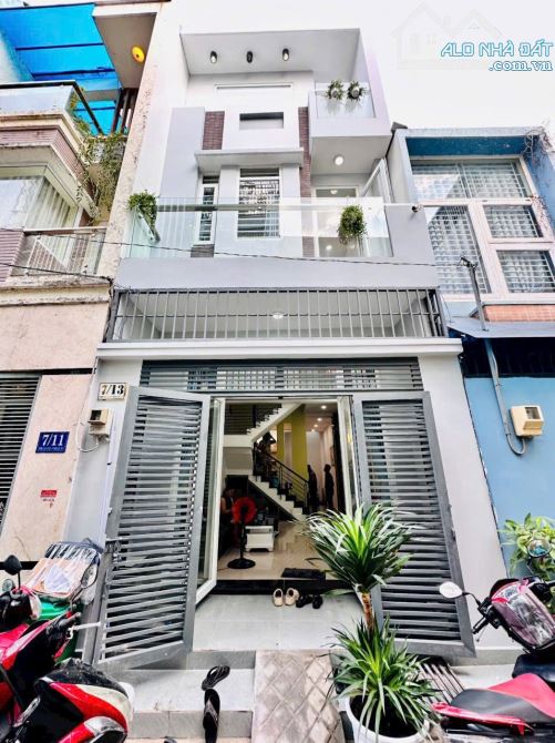Nhà sổ hồng riêng Quận 12 ngã tư Ga â lầu 3PN ban công hỗ trợ bank