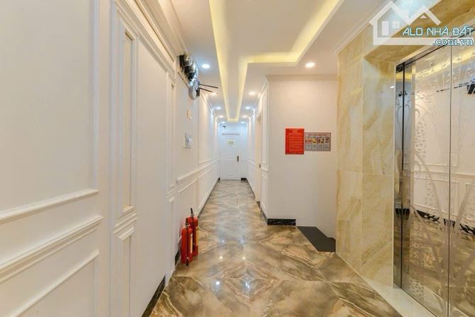 Bán toà căn hộ mặt tiền thích quảng đức vcn phước hải ngang 6m - 1