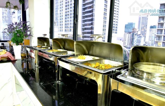 Bán khách sạn 12 tầng mặt tiền đường hùng vương ngang 7m - 1