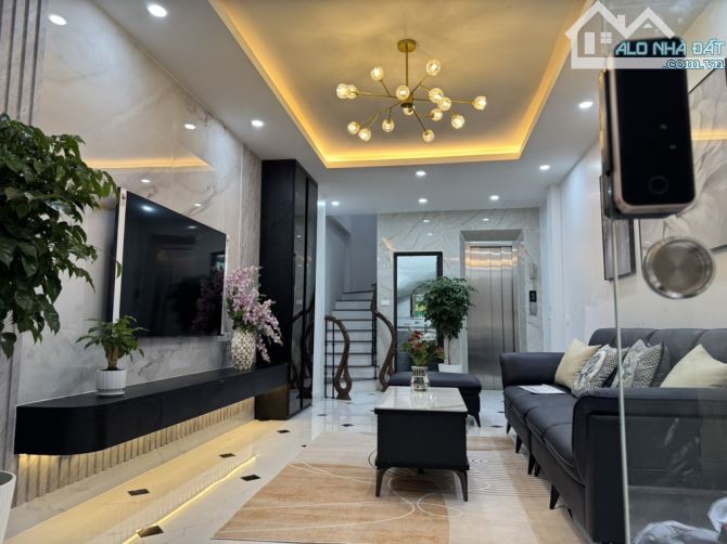 Bán nhà Xuân La, dt38m, 5 tầng Thang máy, mặt ngõ thông, kinh doanh, ô tô. - 1