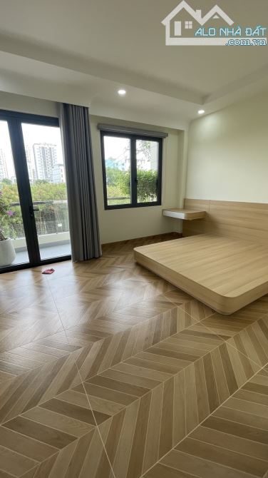 B.án nhà Quận 7 mặt tiền 90m (5x18) 4 tầng thang máy g.ía 14,5 t.ỷ - 2
