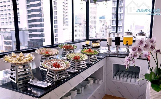 Bán khách sạn 12 tầng mặt tiền đường hùng vương ngang 7m - 2