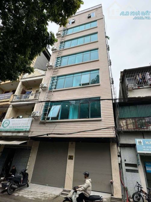 Toà nhà 7 tầng thang máy phố Trung Kính - sát phố - oto tránh dừng đỗ - mặt tiền rộng