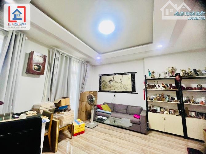 Nhà mặt tiền KD, HXH tránh 10m thông, Nguyễn Phúc Chu P.15, 4 tầng, 5x14m, giá 10,5 tỷ - 4