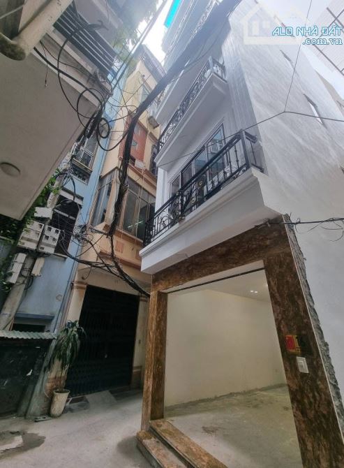 Nhà Lê Trọng Tấn, Tx, 6 tầng thang máy, lô góc 3 thoáng, ô tô đỗ cửa, nhỉnh 14 tỷ