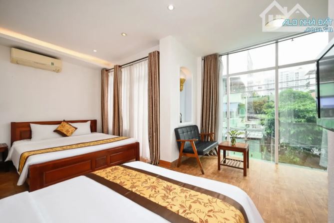 Cho thuê k.sạn 33P- mt phường 2, tân bình- dt:10x27- 8 tầng- giá: 400 tr/th - 1