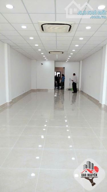 Nguyên toà nhà 7 tầng, thang máy, 5x20 trống suốt, mặt tiền - 1