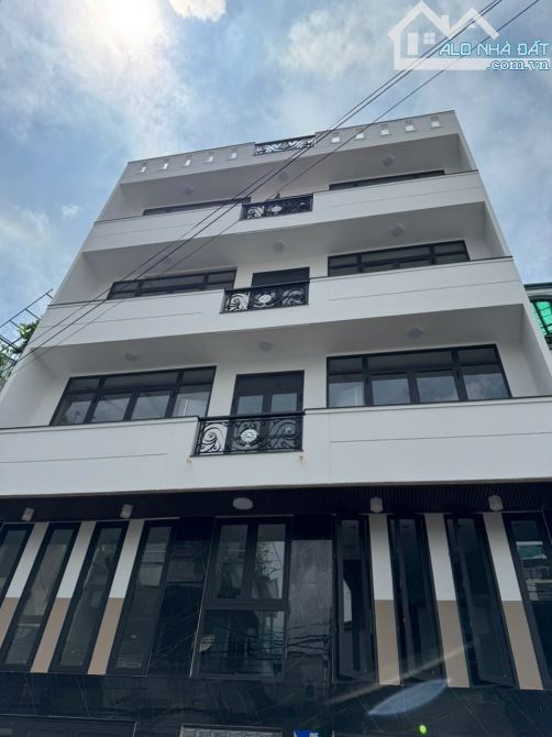 NHÀ BÁN MT 8M– KHU VIP NGAY CHỢ TÂN BÌNH, 6 TẦNG (NGANG 10M X 5,5M) BỀ THẾ. CHỈ 12 TỶY - 2