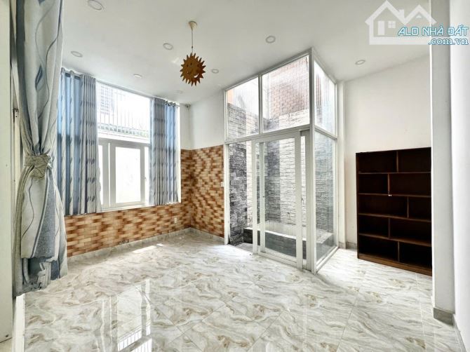 HXH PHAN ĐĂNG LƯU PHÚ NHUẬN - 100M2 NỞ HẬU 7M - 4TẦNG - 4PN- NHỈNH 10 T  Ỷ TL - 2