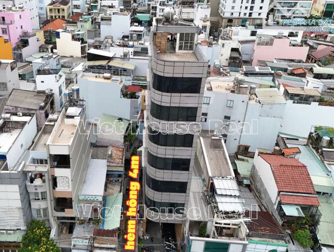 Building góc 2MT 82-84 Lê Quang Định, P. 14, Q.Bình Thạnh. DT: 6.42 x 20.47m. Hầm 7 tầng. - 2