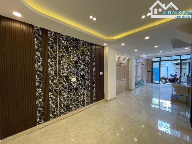 NHÀ 3,5LẦU MỚI HXH ĐƯỜNG NGUYỄN TRỌNG TUYỂN , P15 , QUẬN - PN - 2