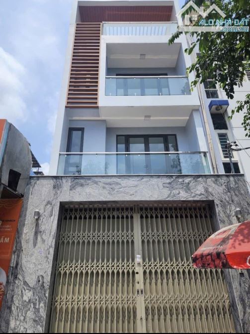 Bán gấp nhà có thang máy MTKD đường Vành Đai Trong khu Tên Lửa 5x20m 3 lầu giá 24 tỷ