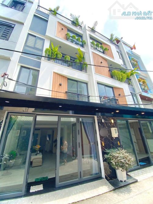 Bán nhà hẻm 5m đường Phan Huy Ích, P.12, 5 x 11, 5 lầu, có thang máy giá 7.15 tỷ tl