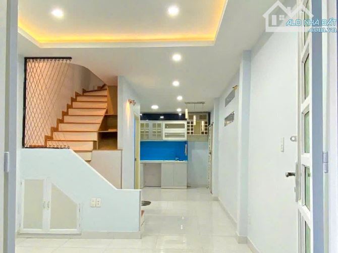 Bán nhà nở hậu 1 lầu 2 mặt hẻm Bạch Đằng, Bình Thạnh