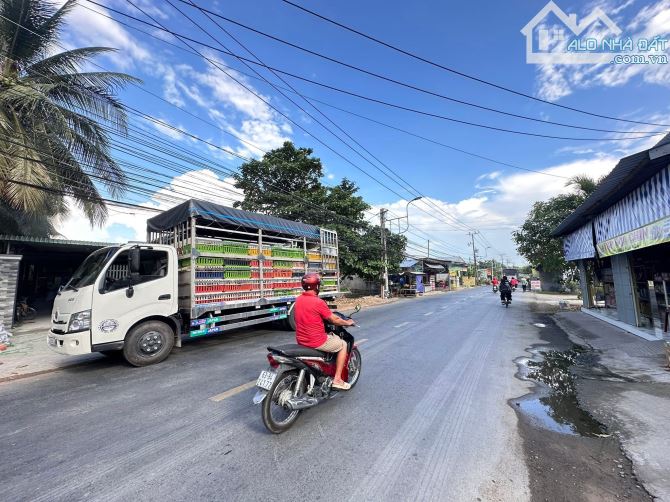 Bán 524 m2 đất có thổ cư mặt tiền đuờng tỉnh lộ 879,cách Quảng Truờng 700m,Đạo Thạnh - 1