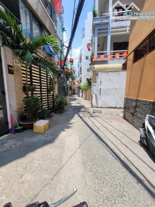 BÁN NHÀ 5 TẦNG, HẺM XE HƠI 4m THÔNG, NGAY SÂN VẬN ĐỘNG HOA LƯ Q1 - 4