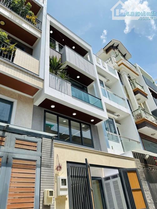 Nhà mới dọn ở liền ngay hẻm 272 Nguyễn Tiểu La, Q10 - Giá 4 tỷ 880 / 60m2(4mx15m) - 1