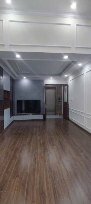 BÁN NHÀ Ngõ Nguyễn Văn Huyên , Cầu giấy, Ô tô vào nha. DT 45m, 7 Tầng, MT 4m, G.Iá 19,5 tỷ - 1