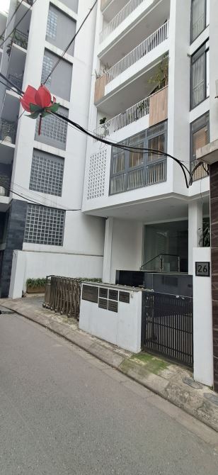 Tòa Apartment 35 Đặng Thai Mai 150M2 7 Tầng MT10M 64 Tỷ nhà có hầm - 1