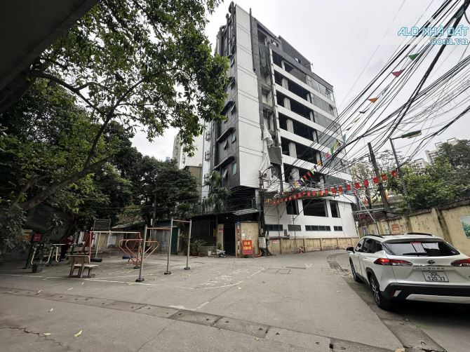 Tòa Building-Lô Góc Mặt Phố Khuất Duy Tiến 95/110m, 9T Thang máy,MT 20m 78.5 Tỷ - 1
