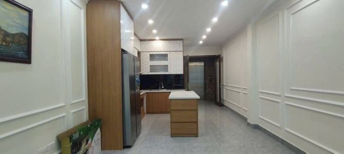 BÁN NHÀ Ngõ Nguyễn Văn Huyên , Cầu giấy, Ô tô vào nha. DT 45m, 7 Tầng, MT 4m, G.Iá 19,5 tỷ - 2