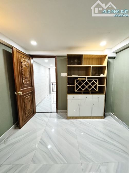 HẺM XE HƠI 7 CHỖ THÔNG - 5 TẦNG BTCT - SÁT MẶT TIỀN - NHỈNH 5T.Ỷ - BÙI QUANG LÀ, PHƯỜNG 12 - 2