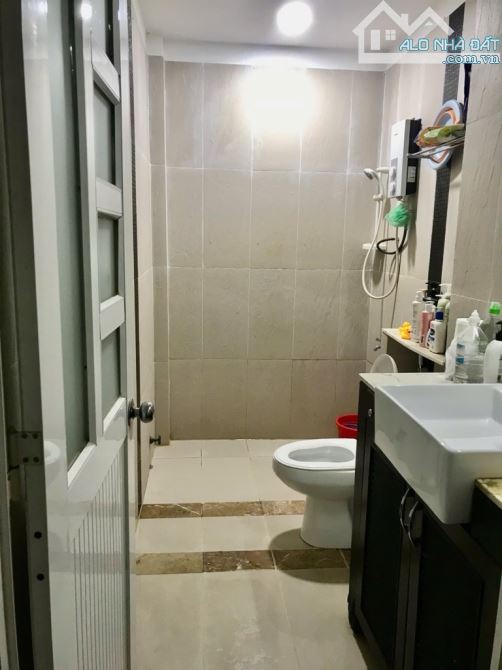 Bán gấp nhà đẹp ở ngay Trần Xuân Soạn, hẻm cao ráo sạch sẽ, 58m2(4.2x14), SHR, chỉ 6.5tỷ. - 3
