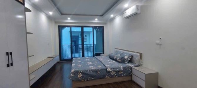 BÁN NHÀ Ngõ Nguyễn Văn Huyên , Cầu giấy, Ô tô vào nha. DT 45m, 7 Tầng, MT 4m, G.Iá 19,5 tỷ - 4