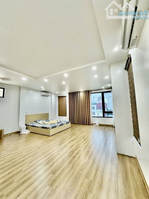 Mặt phố Đông Quan Phùng Chí Kiên - ô tô tránh - tòa nhà 7 tầng thang máy, lô góc - 55m - 4