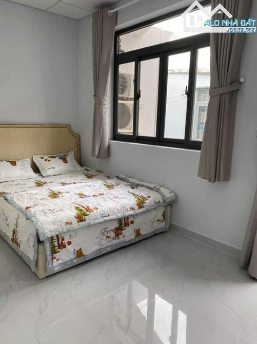 Cần bán nhà ngay Nguyễn Thái Sơn, Gò Vấp. Giá: 2 tỷ 320 /63,5m2, sổ hồng riêng, hẻm 6m - 6