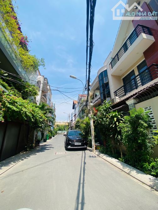 BÁN NHÀ MỚI HẺM XE HƠI TRÁNH NHAU NGAY ĐẠI HỌC HUTECH 4X16,5M 4 TẦNG
