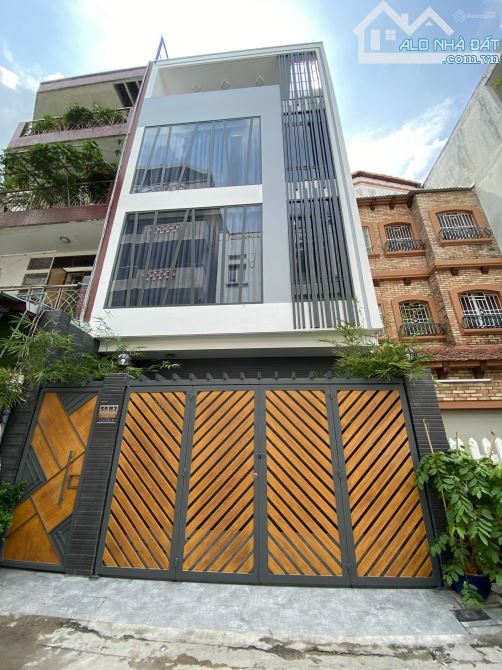 Hẻm xe hơi Hoàng Hoa Thám - T3, Tân Bình. DT: 7x20m, 4 tầng nhà mới, giá bán 21 tỷ