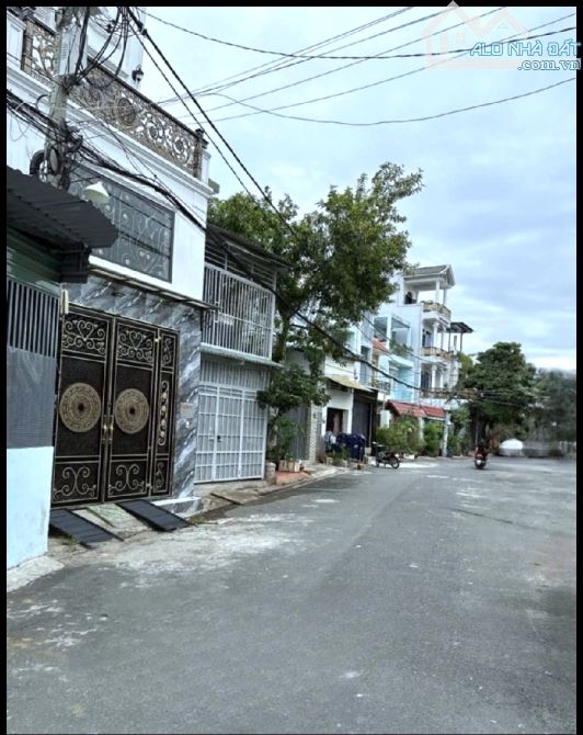 BÁN GẤP NHÀ MẶT TIỀN 70M2(5X15M), ĐƯỜNG 10M THÔNG TRUNG MỸ TÂY. 4 TỈ