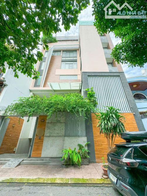 BIỆT THỰ 7 TẦNG 200M2 NGANG 12.5 – HẦM, HỒ BƠI – NGAY NHÀ GA T3 – CHỈ 69 TỶ TL