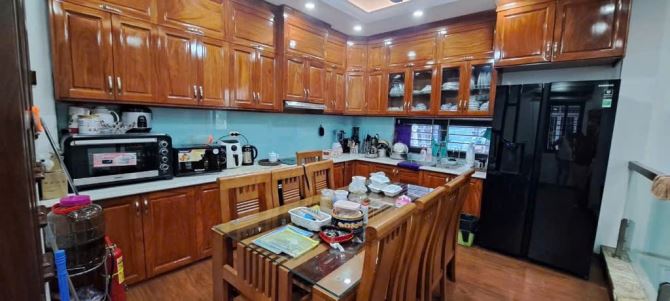 Bán nhà Đẹp ở ngay Hồng tiến- Ô Tô - Ngõ thôngThoáng vĩnh viễn -55m 5 tầng mặt tiền 5,2m
