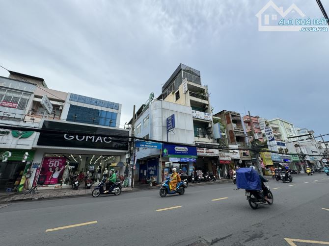Cho thuê nhà Góc 2MT 385B Cách Mạng Tháng Tám, Q.10 - DT 7.4x20m - 1