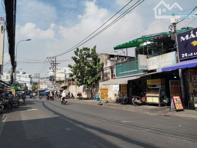 Bán đất xây tòa nhà VP mặt tiền 12m sát Phạm Văn Đồng 215m2 rộng 9.3m ngay trung tâm 30 tỷ - 1