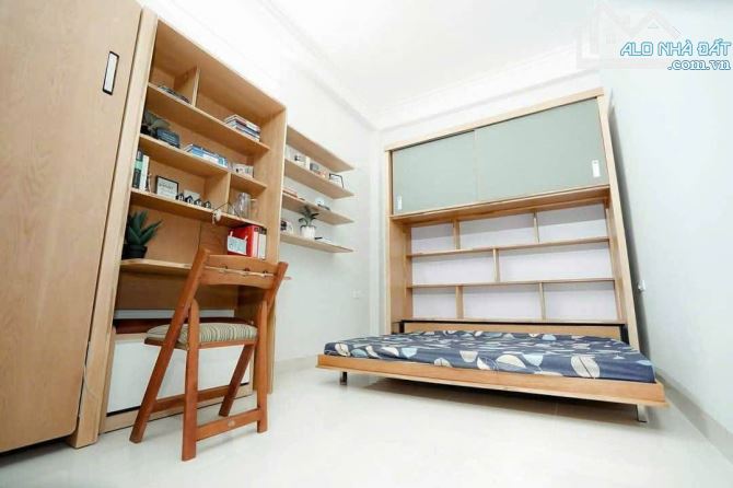 NHÀ DÂN XÂY. TRUNG KÍNH. CẦU GIẤY. 7 TẦNG THANG MÁY HIỆN ĐẠI. 100 M2. GIÁ 28 TỶ. - 2