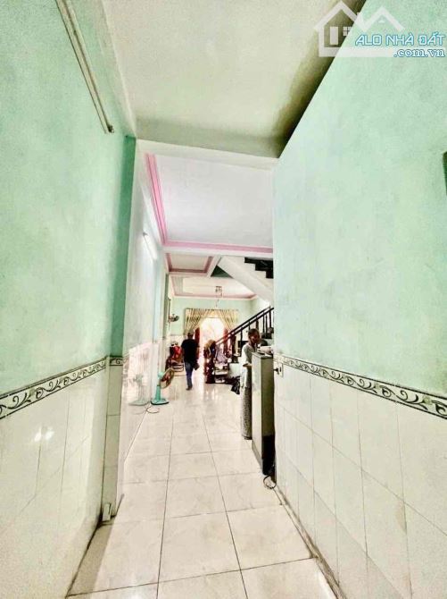 NHÀ 2 TẦNG SƠN TRÀ- MẶT TIỀN ĐƯỜNG 10m5 - ĐỐI DIỆN CHỢ - VỈA HÈ 5m - THUẬN TIỆN KINH DOANH - 2