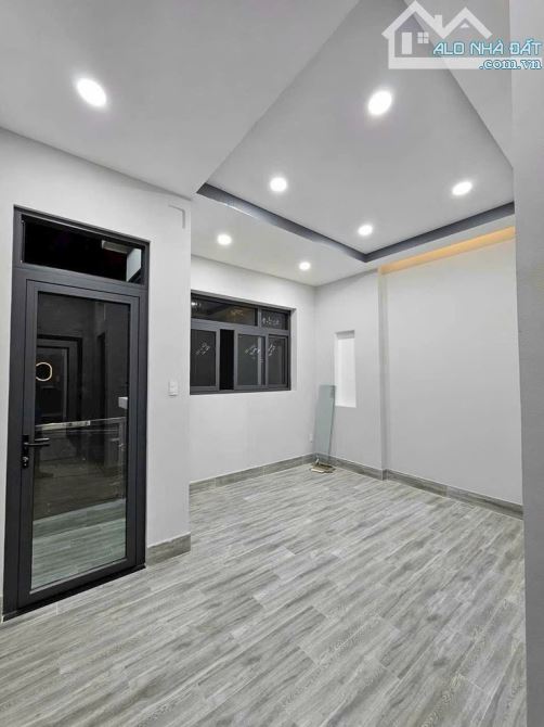 NHÀ HUỲNH TẤN PHÁT Q7 - CĂN GÓC - XE HƠI ĐỖ CỬA - NHÀ 4 TẦNG - NHỈNH 7 TỶ - 2