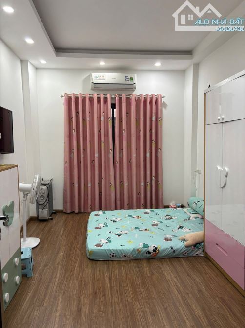 BÁN NHÀ PHỐ HỒNG TIẾN 6 TẦNG Ô TÔ ĐỖ CỬA, THÔNG HỒ BỒ ĐỀ NHỈNH 7 TỶ - 4