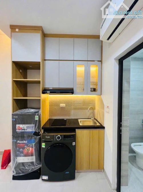 Cần bán gấp tòa nhà dòng tiền doanh thu cao Phạm Văn Đổng 57m2, 6T, mt rộng, thang máy, 15 - 6