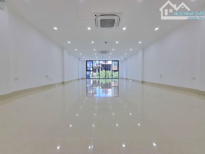 TOÀ VĂN PHÒNG 9 TẦNG MẶT PHỐ NGUYỄN NGỌC NẠI - ĐẸP NHẤT PHỐ - VỈA HÈ KINH DOANH SẦM UẤT - 1