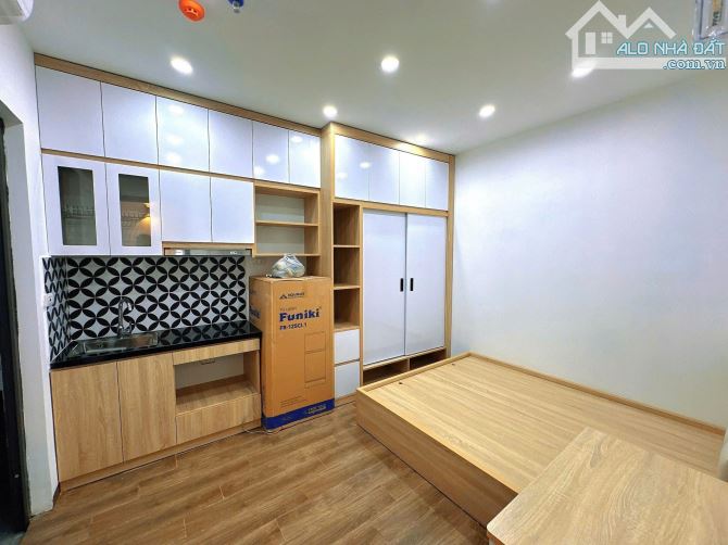 Tòa chung cư mini Tam Khương, 18p, dt 1 tỷ/năm, gần ĐH Y, đủ PCCC, 82m
